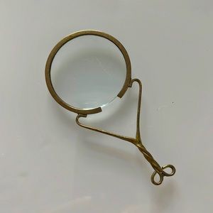 Vintage gold magnifying glass